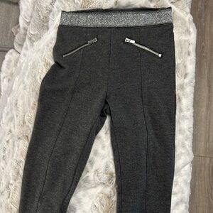 H&M skinny leg pants, like leggings, elastic band waist, zipper pockets at hips
